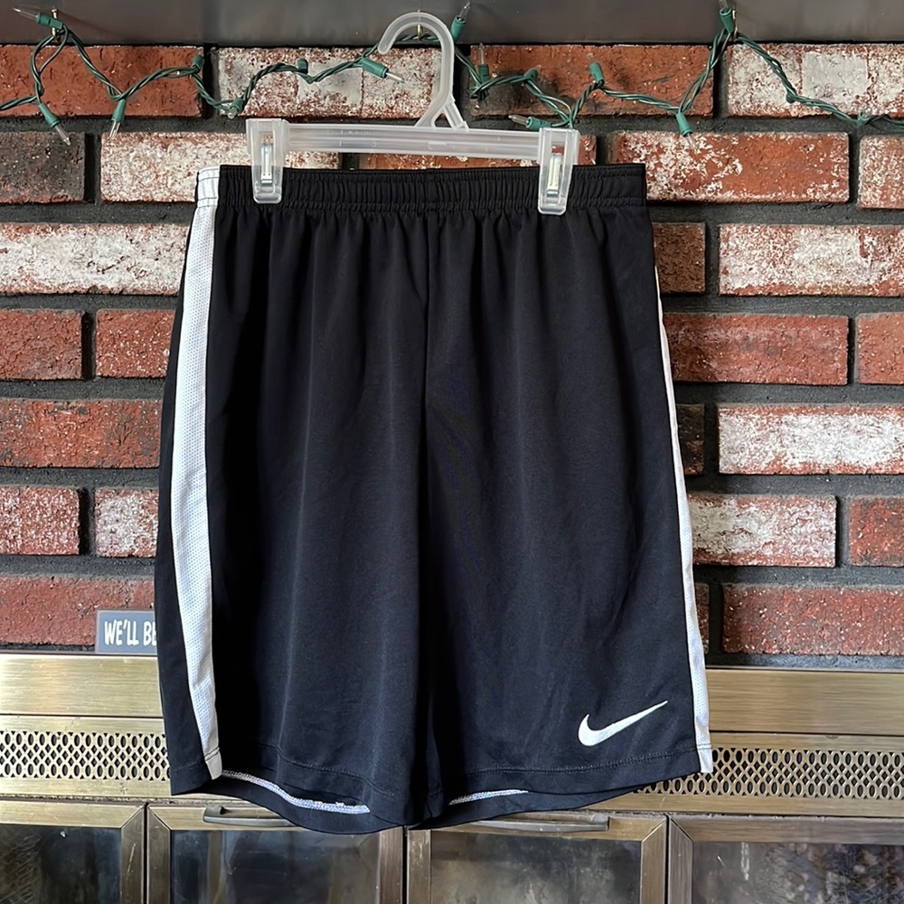 Boys black and white Nike shirts. Size M.